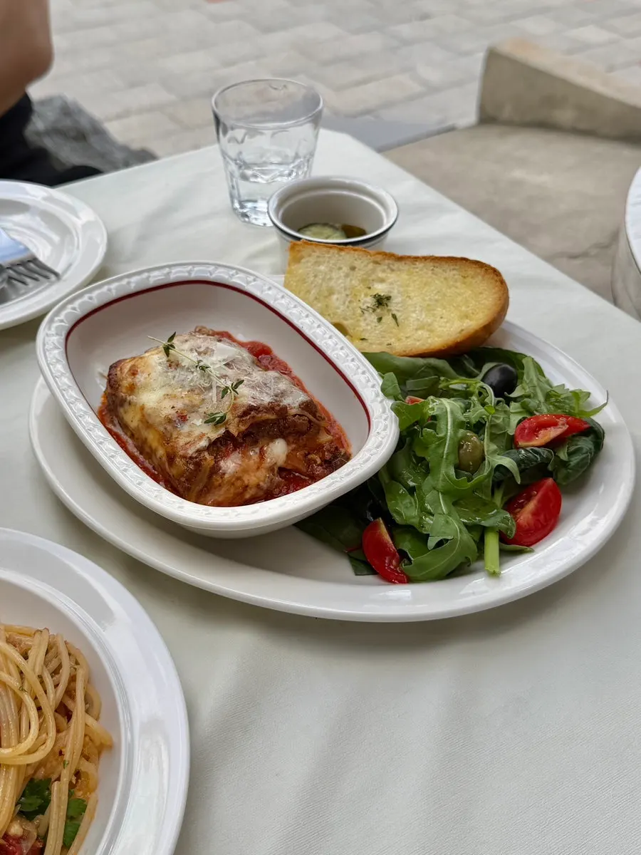 Cross-section of the lasagna with its side dishes