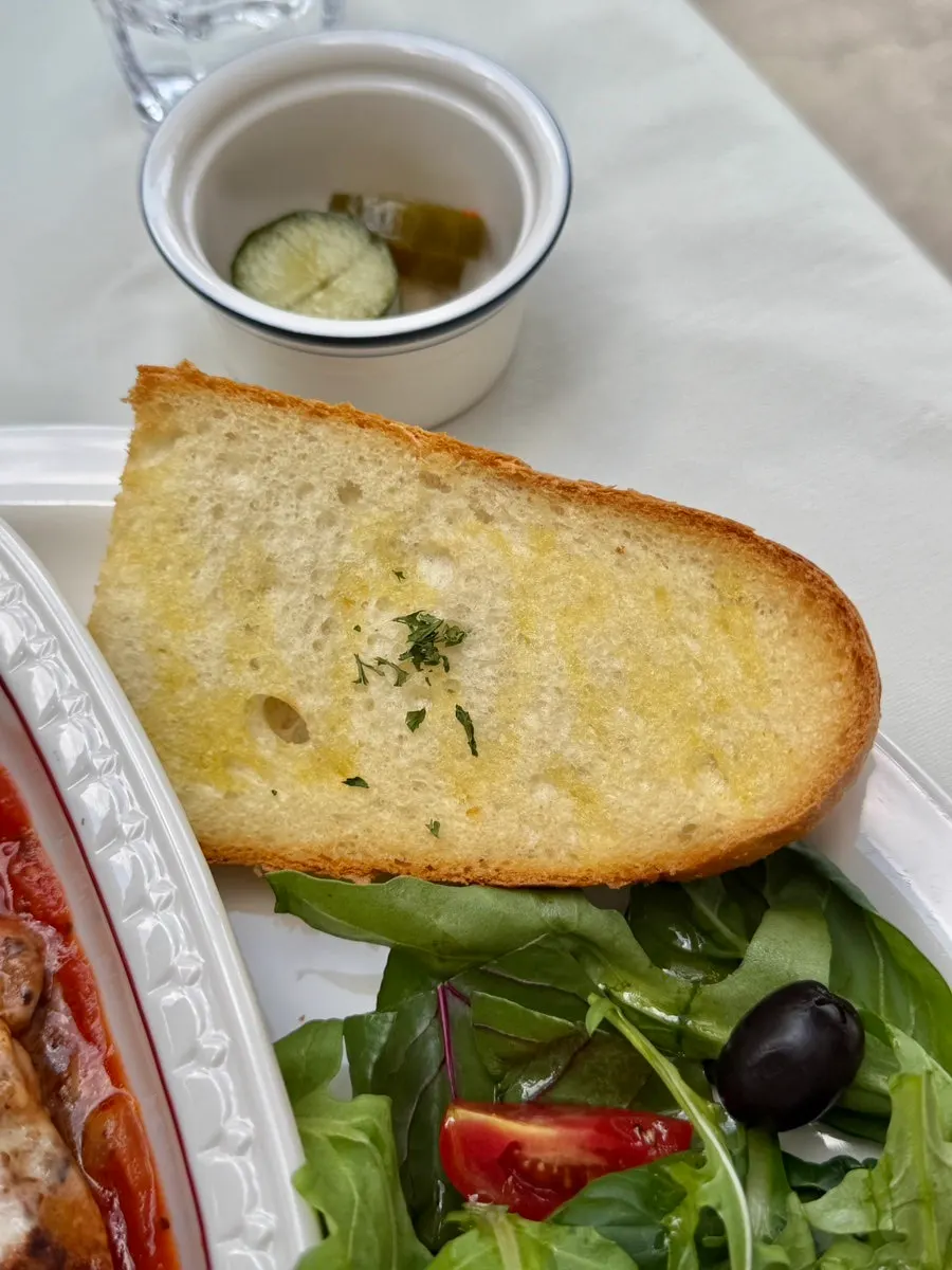 Thick-cut bread served with the lasagna