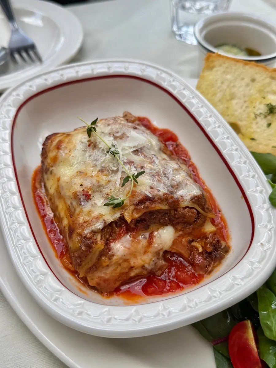 Lasagna piled on top of bread