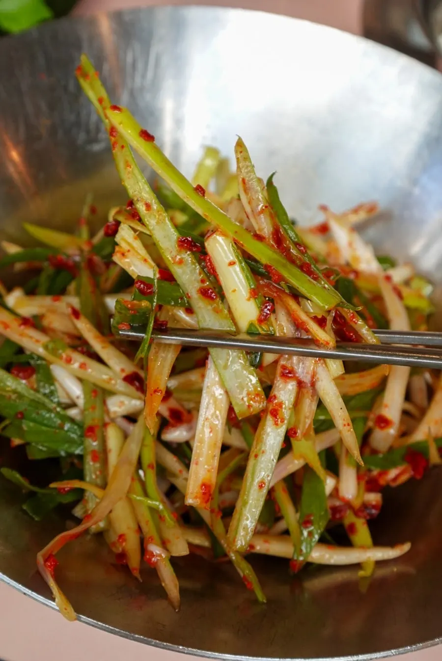 Side dish plate with white kimchi and wasabi