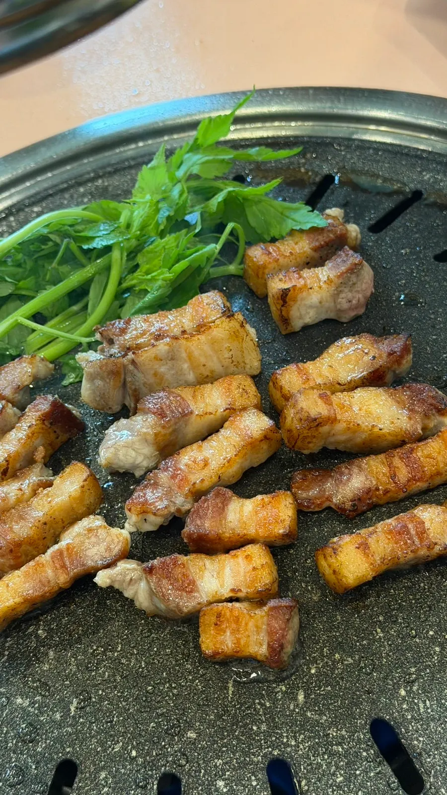 Grilled vegetables and pork belly on the plate