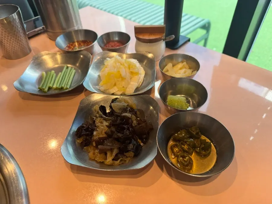 Basic side dish setting with pickles and white kimchi