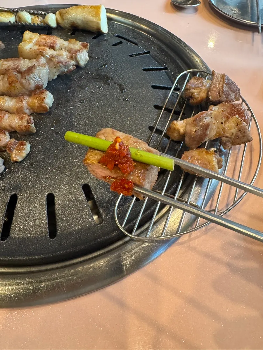 Meat combo with garlic scapes and herring roe