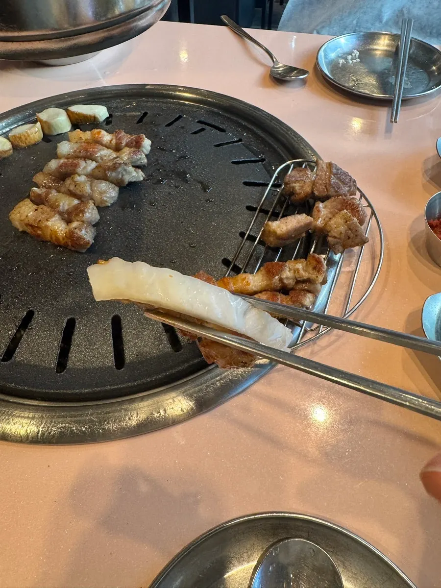 Grilled meat wrapped in white kimchi