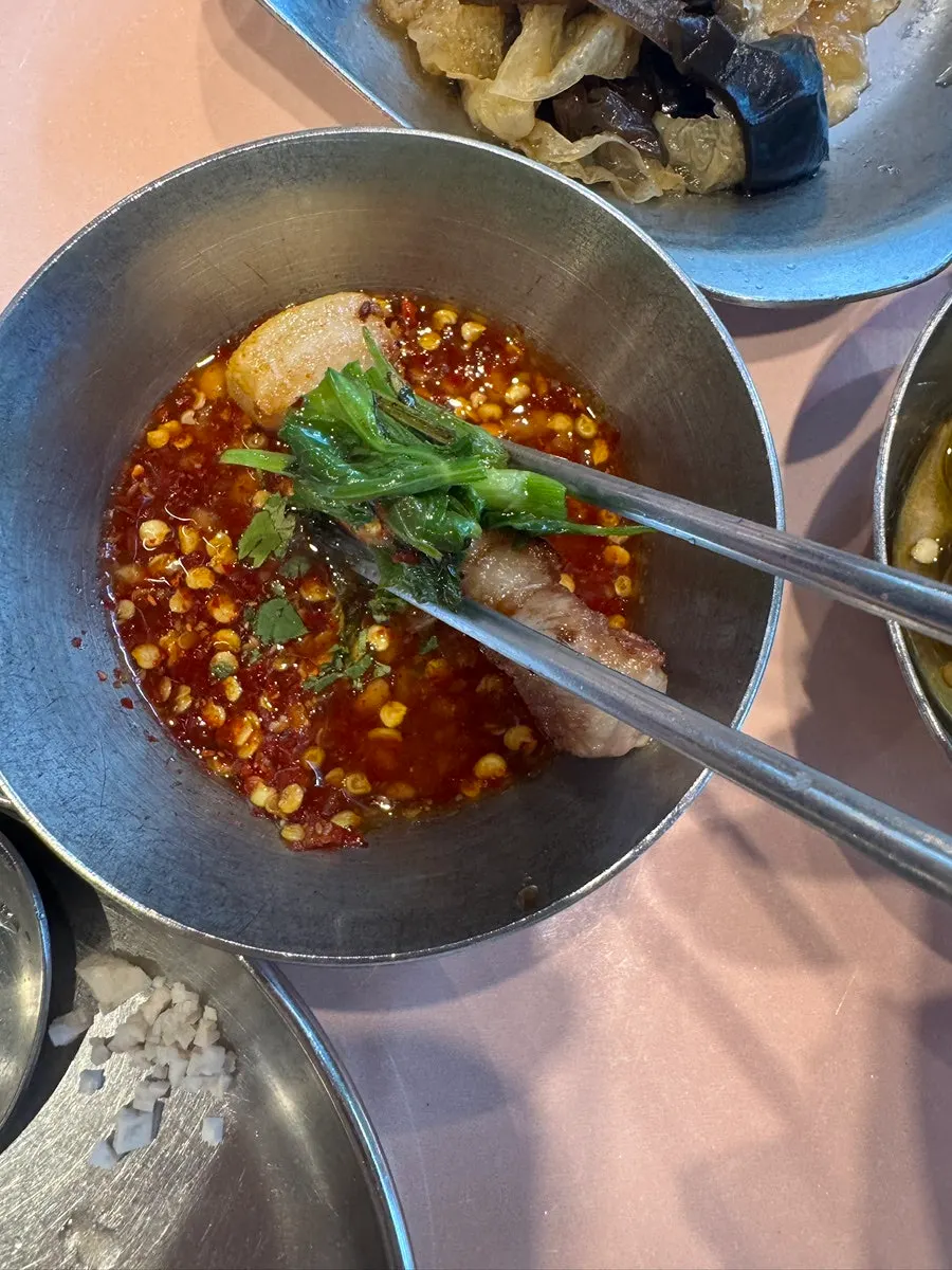 Rich sauce served alongside the meat