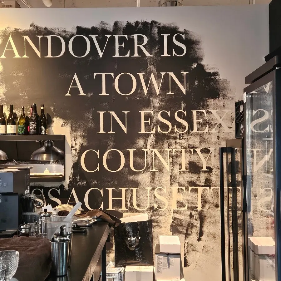 Andover's black-and-white photos filling the wall
