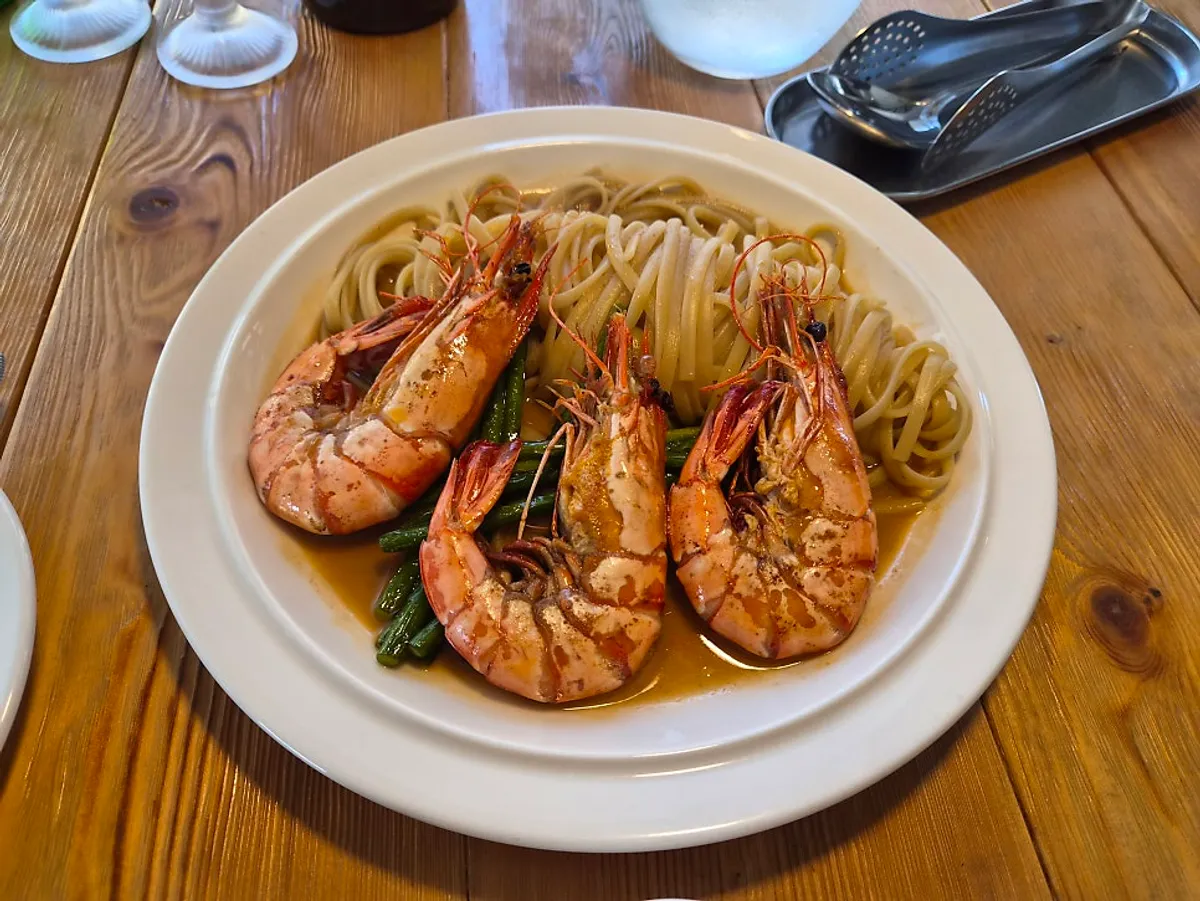 Andover's shrimp bisque pasta topped with large shrimp