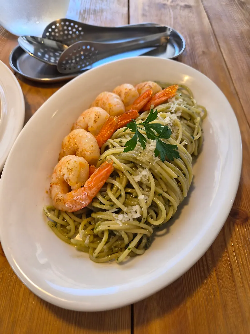 A beautifully plated dish of basil oil pasta