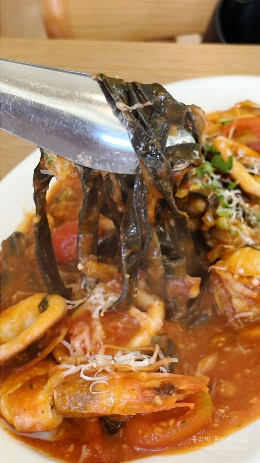 Strands of black squid ink fettuccine