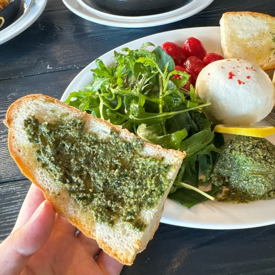 Basil salad served with baguette