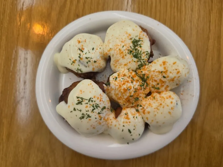 Baby potatoes fried and served with truffle cream sauce