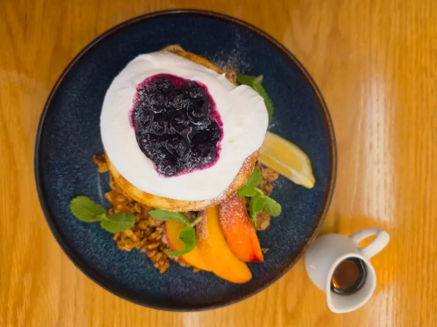 Ricotta pancakes topped with blueberry compote