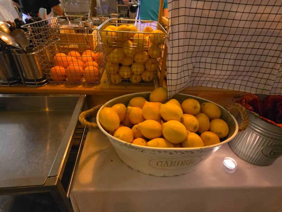 Fresh oranges and lemons displayed in the shop