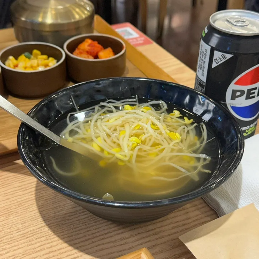 Bean sprout soup and side dishes served with bulgogi