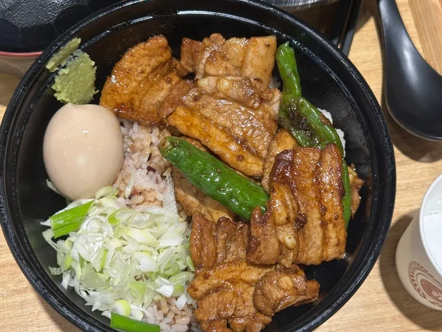 Table with pork cutlet and cold soba served together