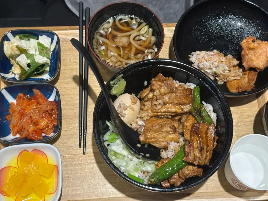 Table with all four dishes being shared