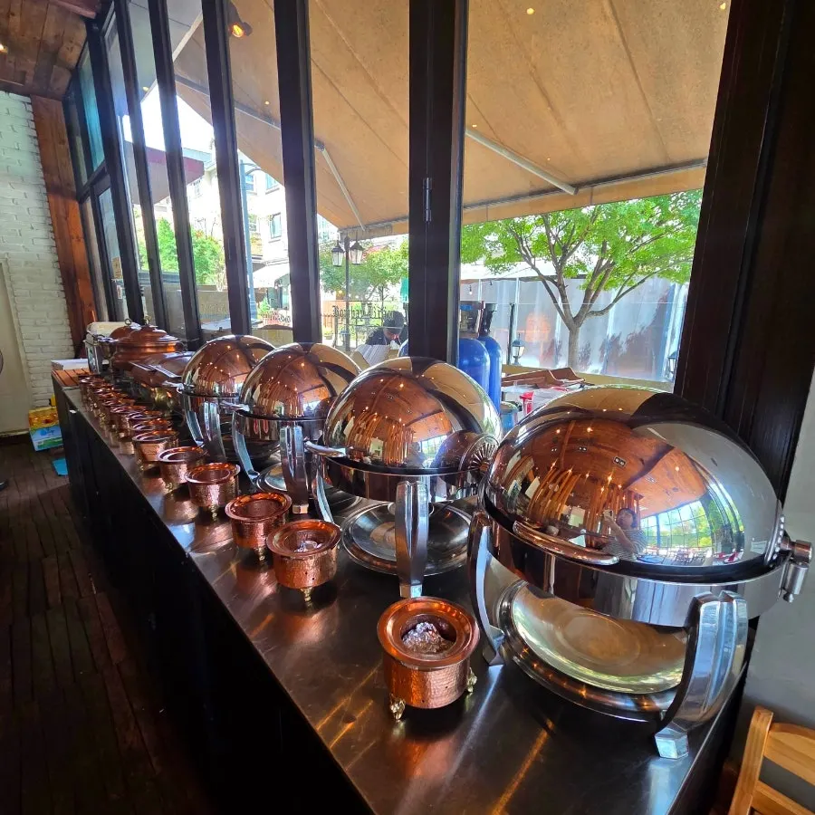 Restaurant interior with a park view
