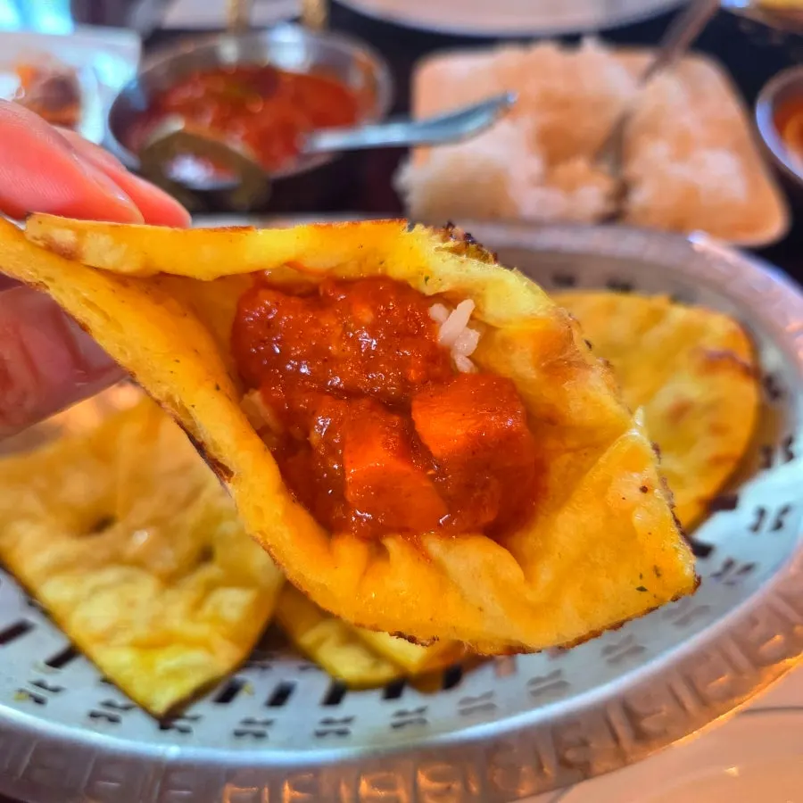 Naan with rice and curry