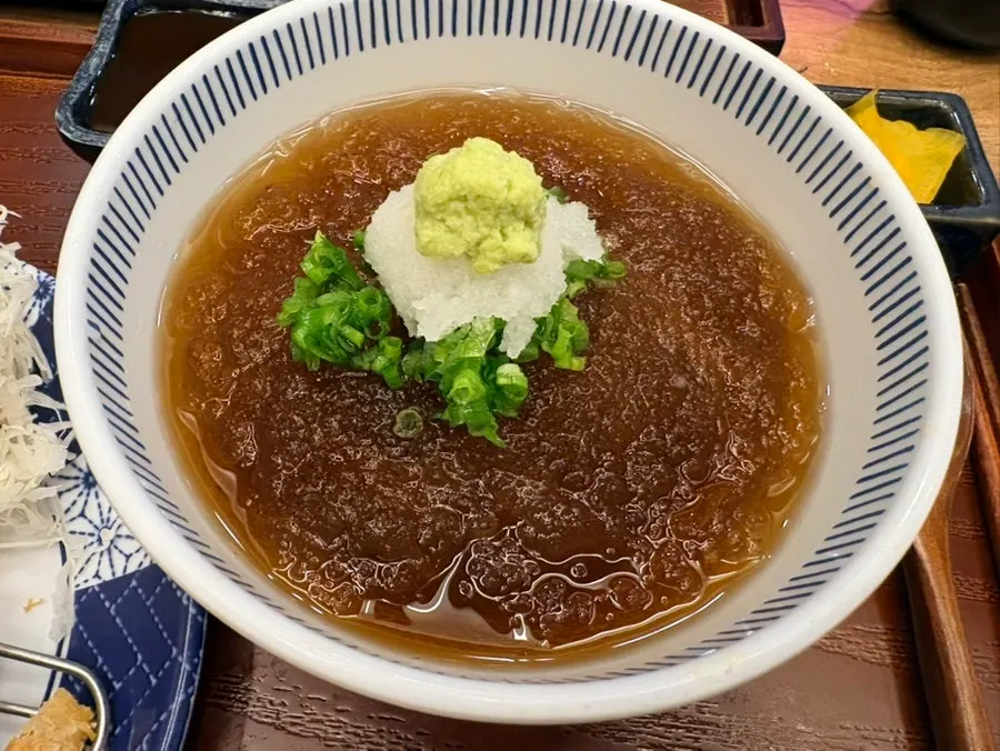 Cross-section of the mozzarella cheese katsu with cheese pull