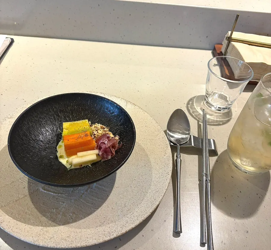 Watermelon gazpacho and grilled vegetable salad appetizer