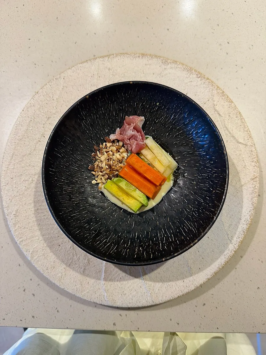 Grilled vegetable salad with prosciutto