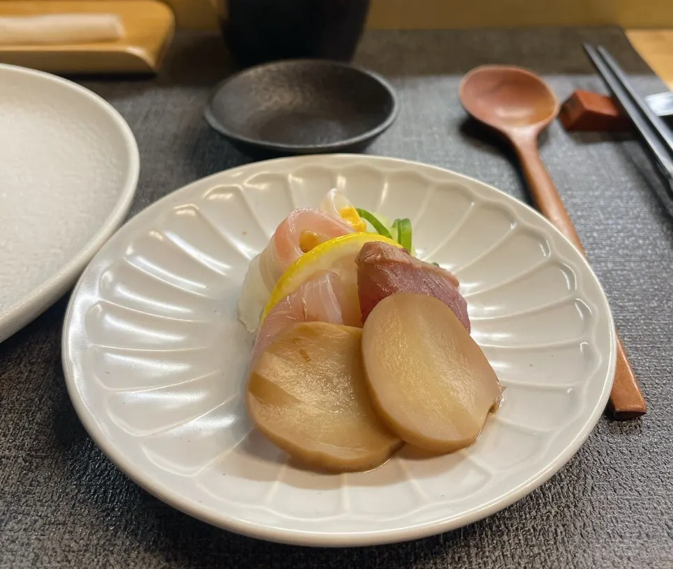 Four kinds of sashimi: halibut, red seabream, amberjack, smoked tuna