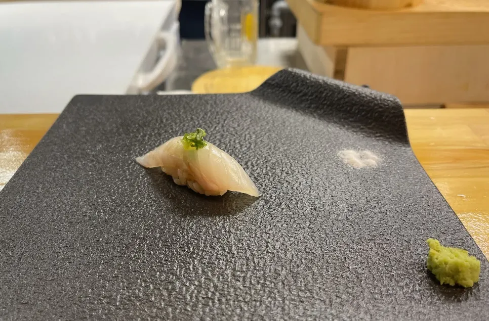 Close-up of truffle halibut sushi