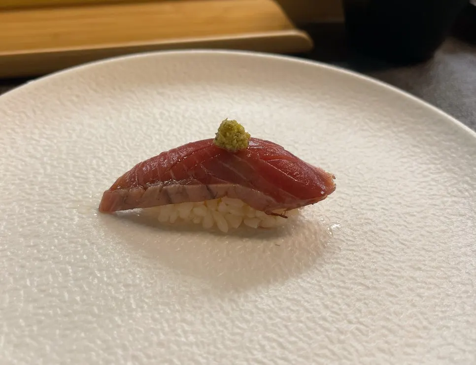 Close-up of smoked tuna basil pesto sushi