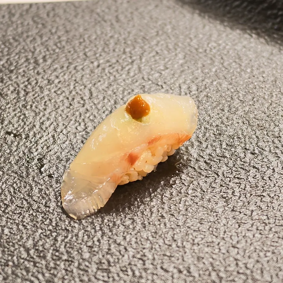 Flounder sushi topped with truffle