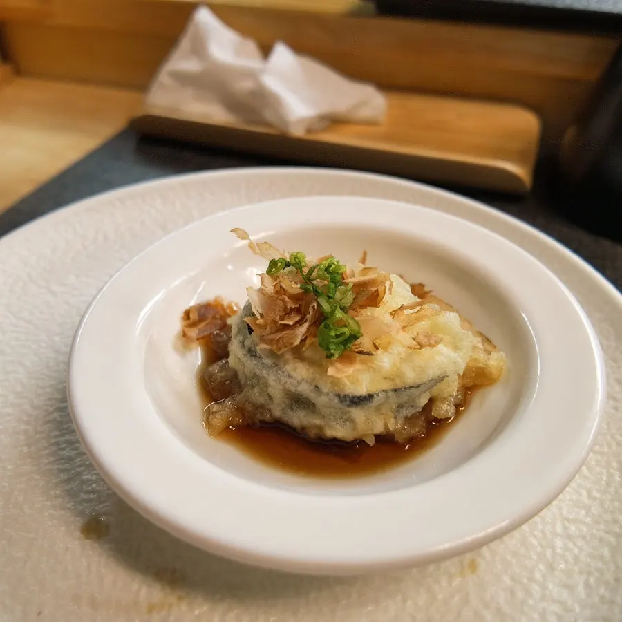 Akami (lean tuna) sushi topped with basil pesto