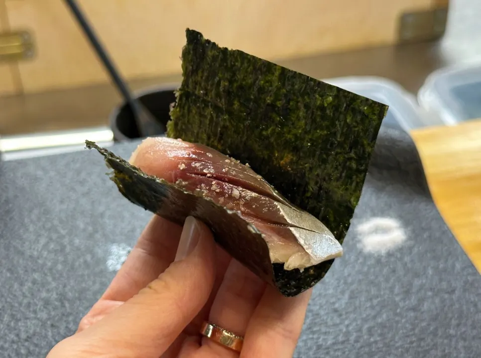 Sushi served already seasoned with soy sauce