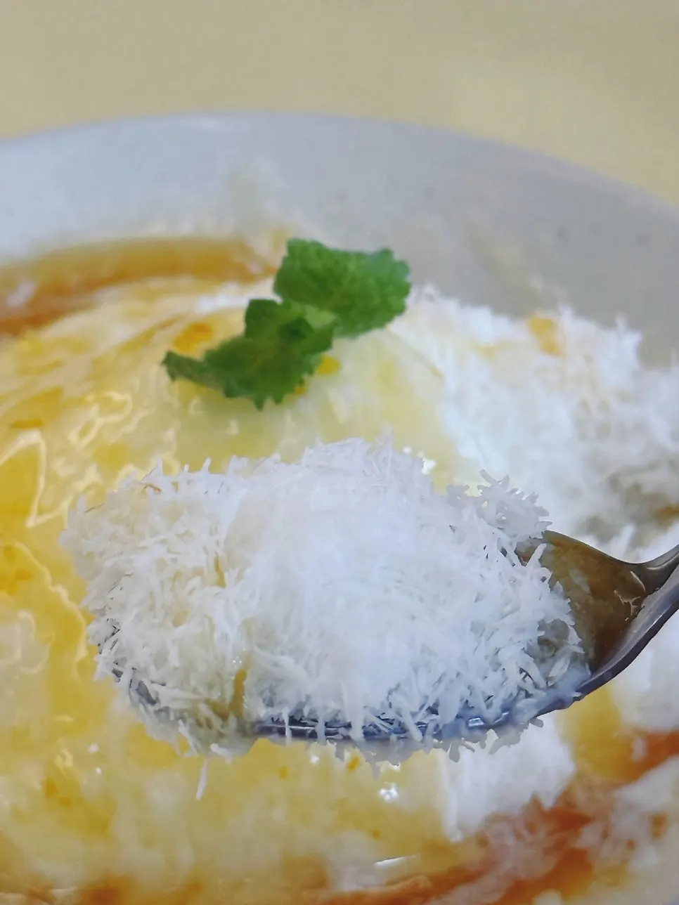 Mini yuzu bingsu topped with yuzu sauce