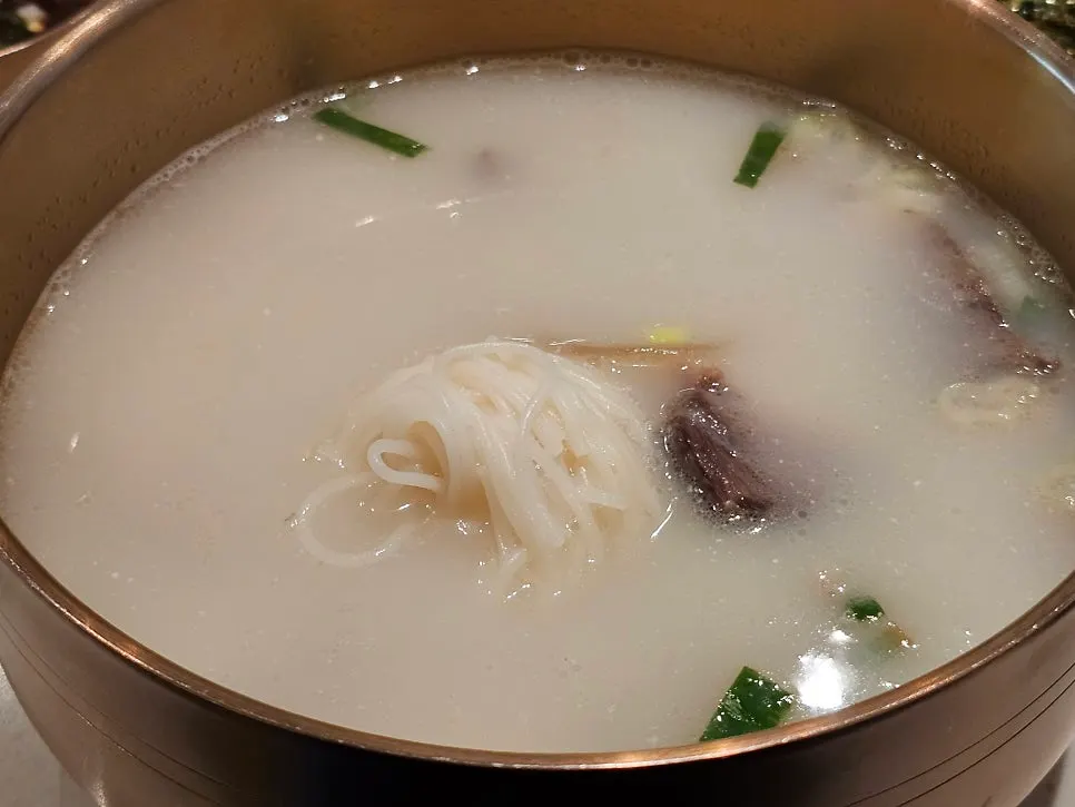 Korean beef milky gomtang shared with a child
