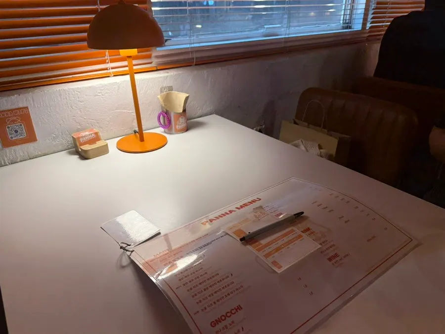 Warmly lit interior atmosphere at Panna Seomyeon Main Branch