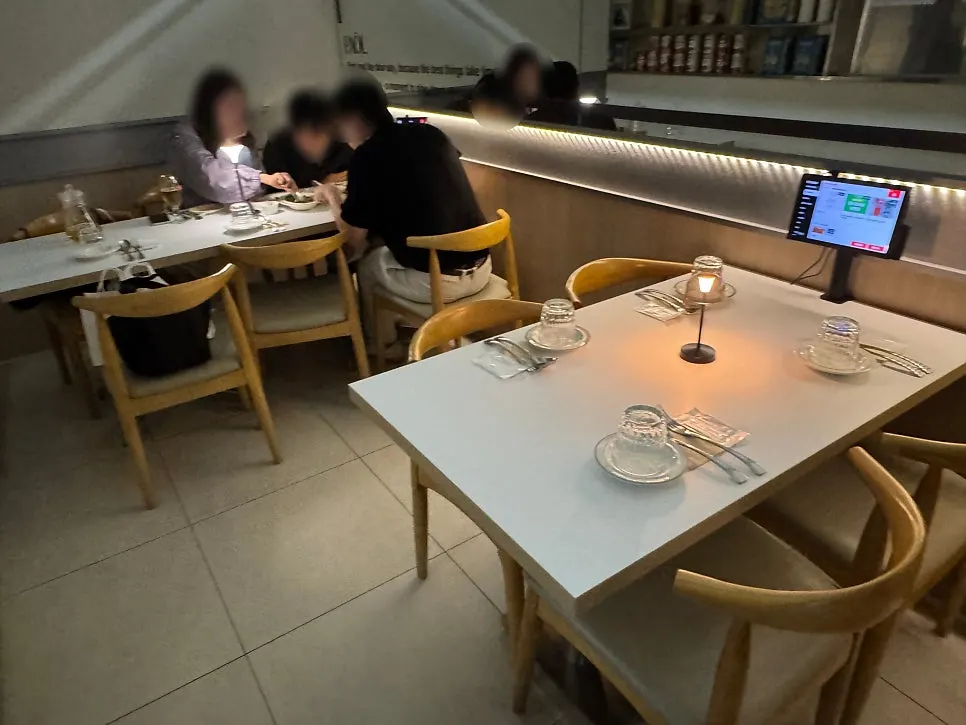 View of the Paol dining hall with a 6-person table