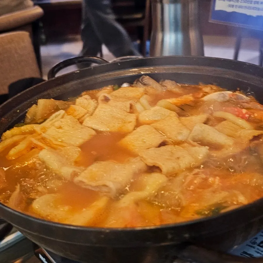 Dumpling and fish cake skewers added to the stew