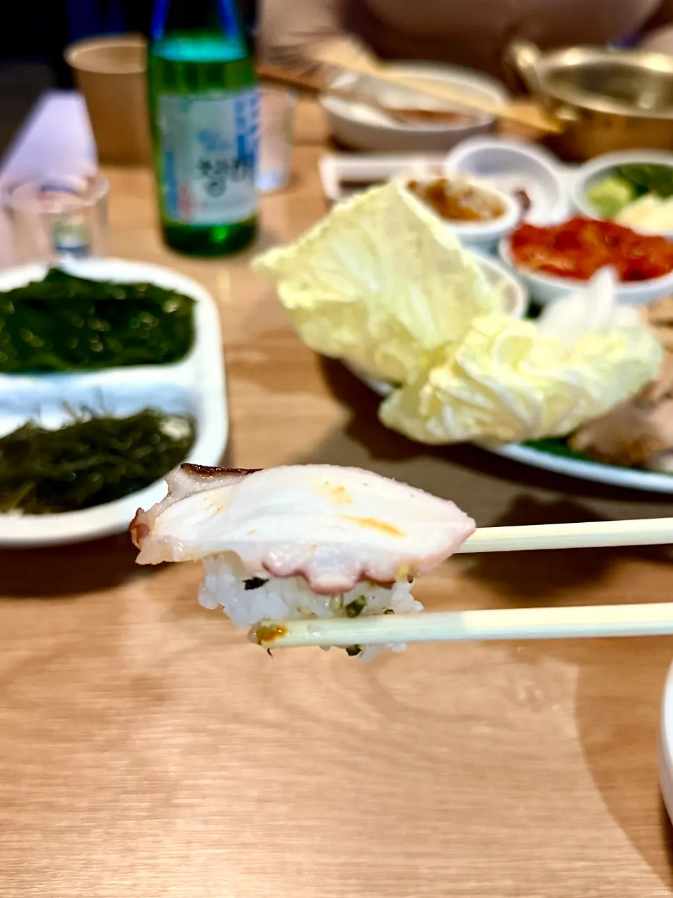Octopus sashimi placed on sushi rice