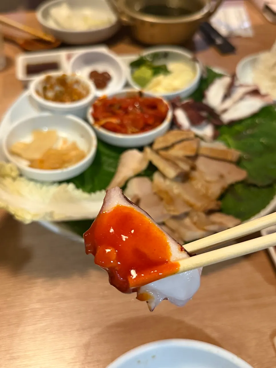 Raw octopus sashimi dipped in chojang sauce
