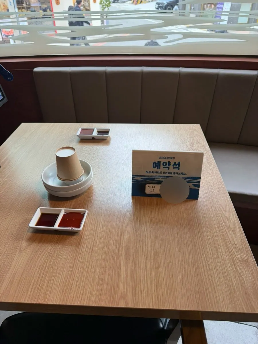 Reserved table with name written for Naver reservation