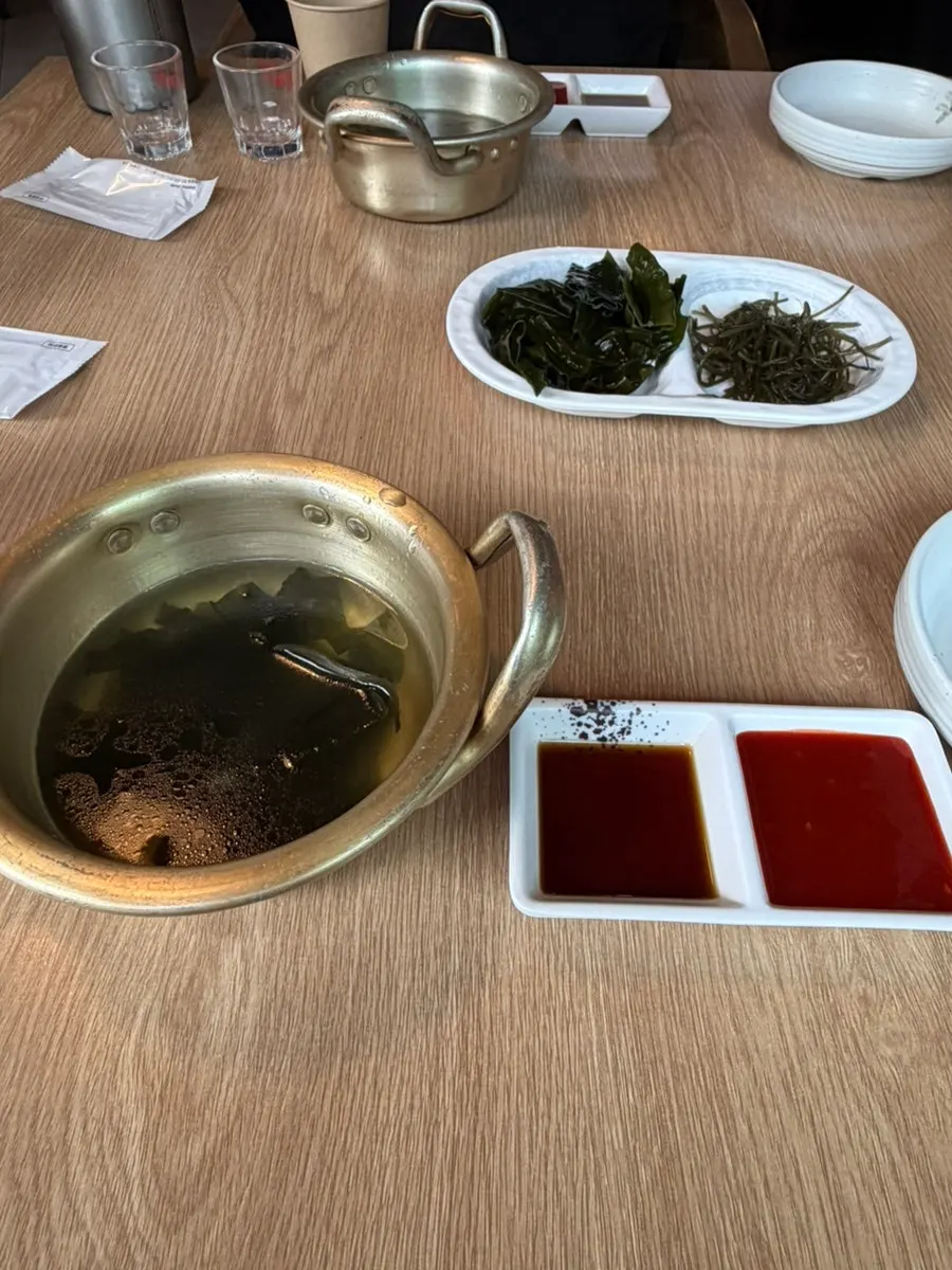 Seaweed soup served as a complimentary side dish