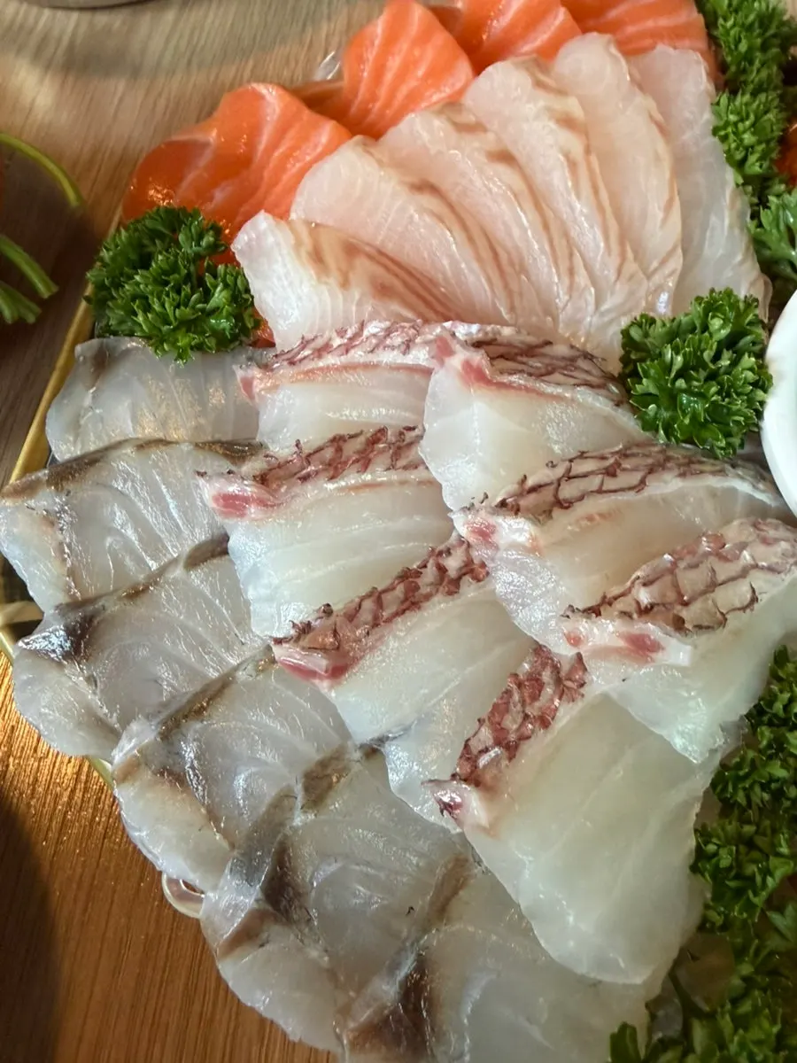 Four types of aged sashimi: salmon, flounder, mullet, sea bream