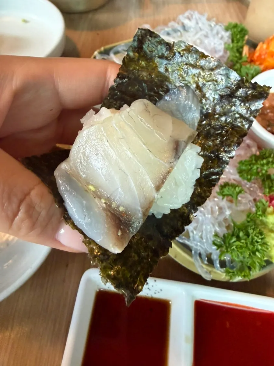 A finished bite of self-made sushi