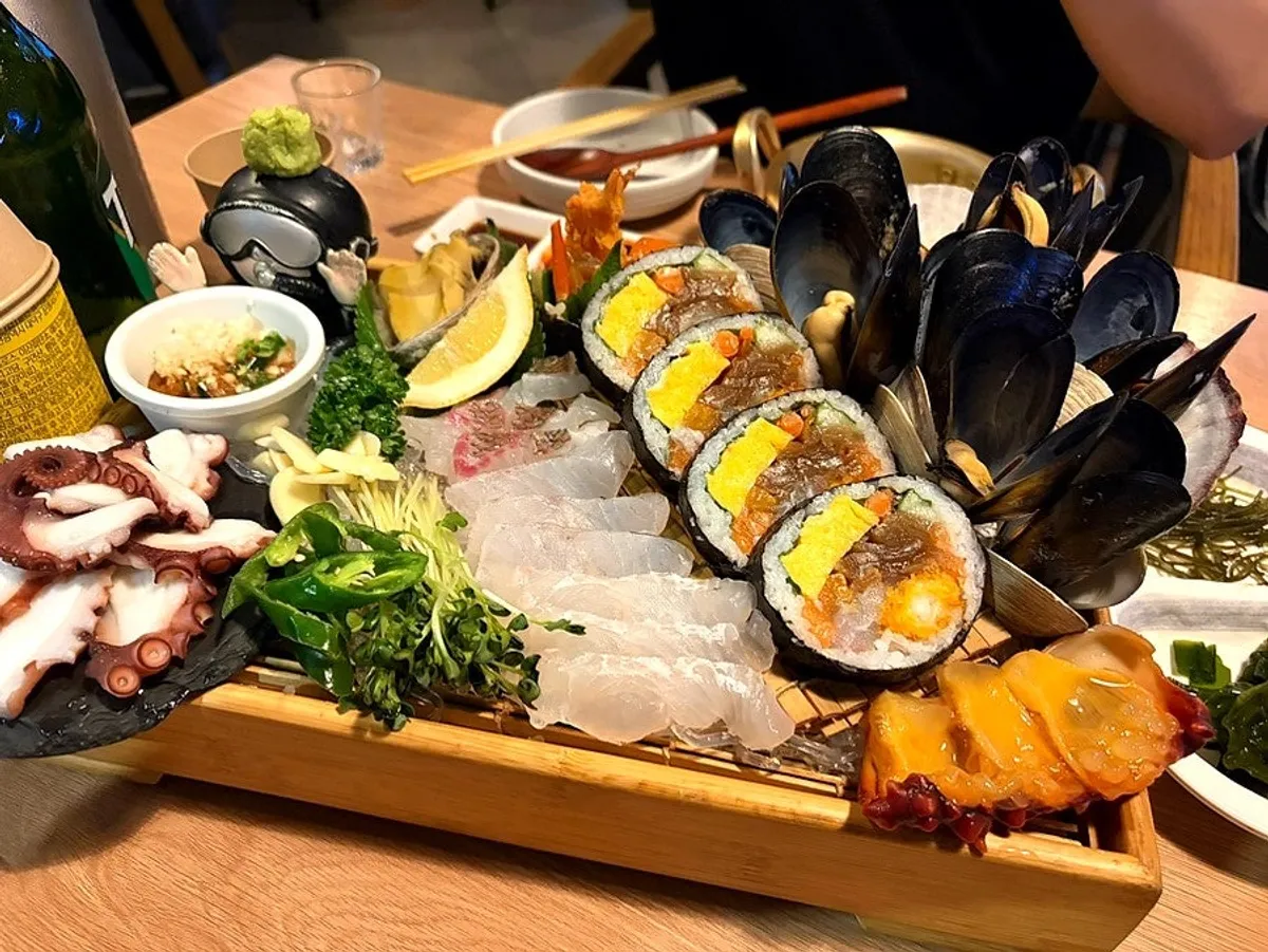 A full platter of the signature haenyeo box with aged sashimi and seafood