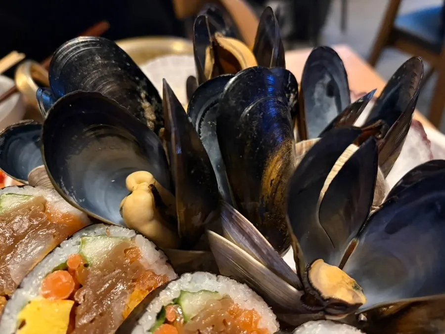 Generous mussels piled in the haenyeo box