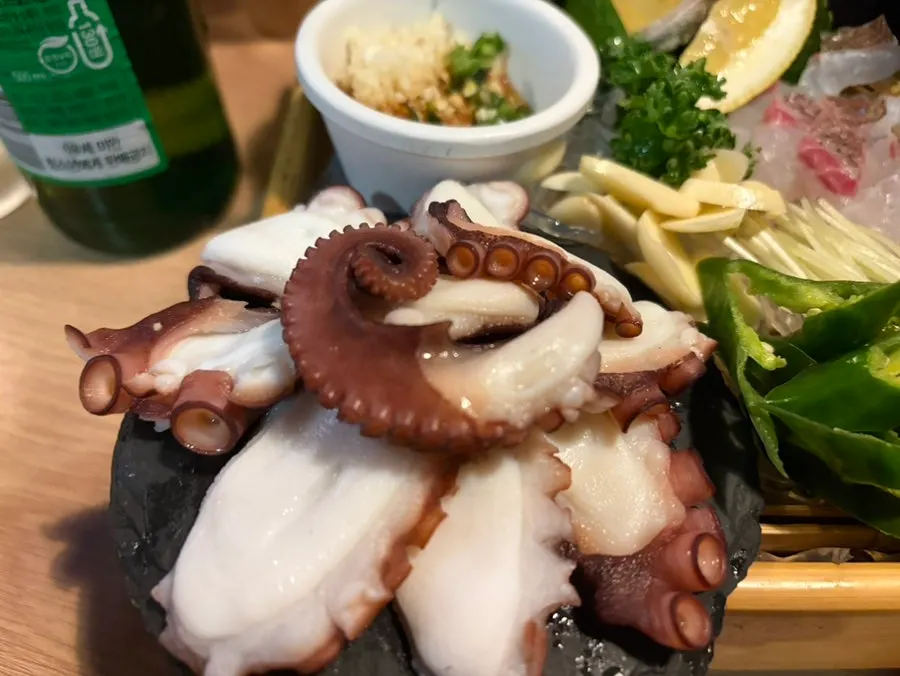 Plump boiled octopus served as suhoe