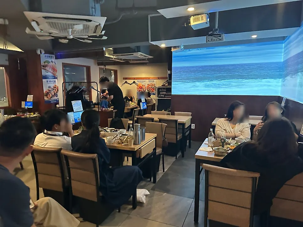 Interior seating at Parang Haenyeojip Sinsa Direct Store