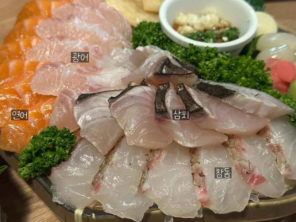 Plate of aged sashimi with flounder, salmon, mackerel and red seabream