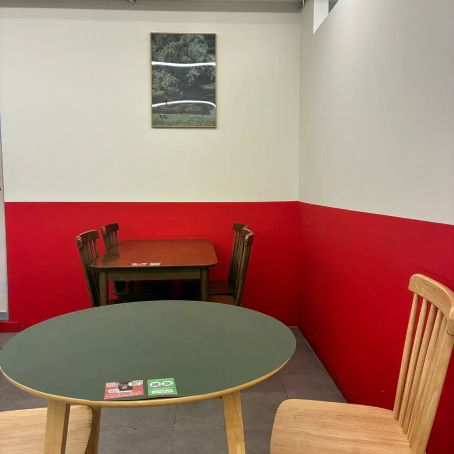 Spacious inner hall and seating area of the store