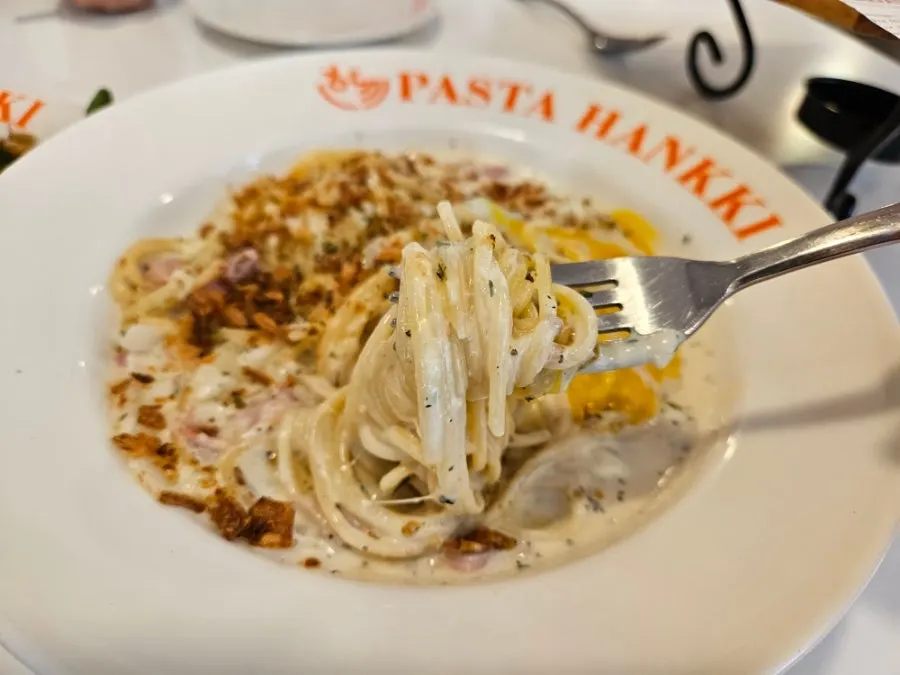 Carbonara thickened with mixed-in poached egg