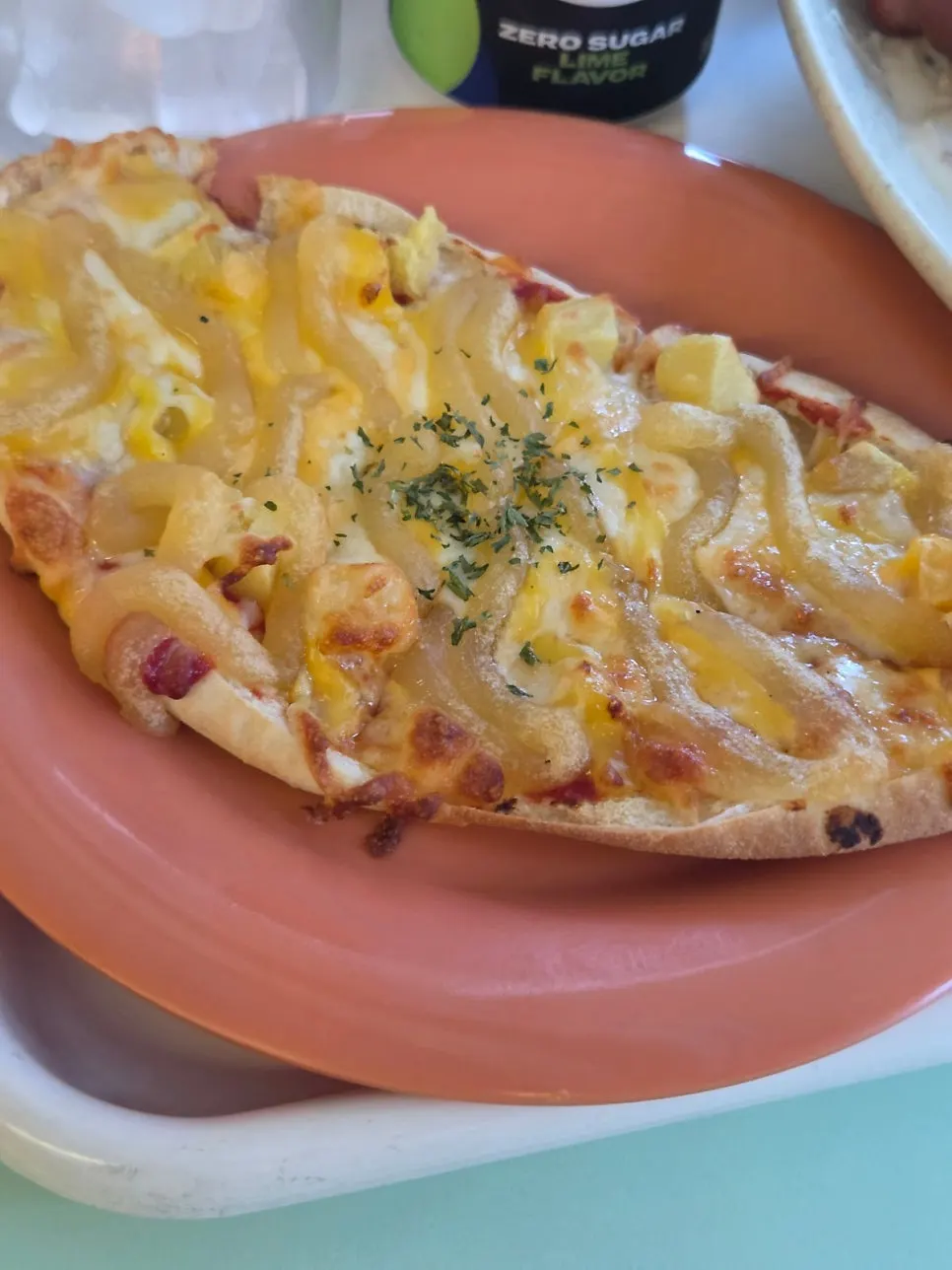 Surface of a freshly baked sweet potato pizza